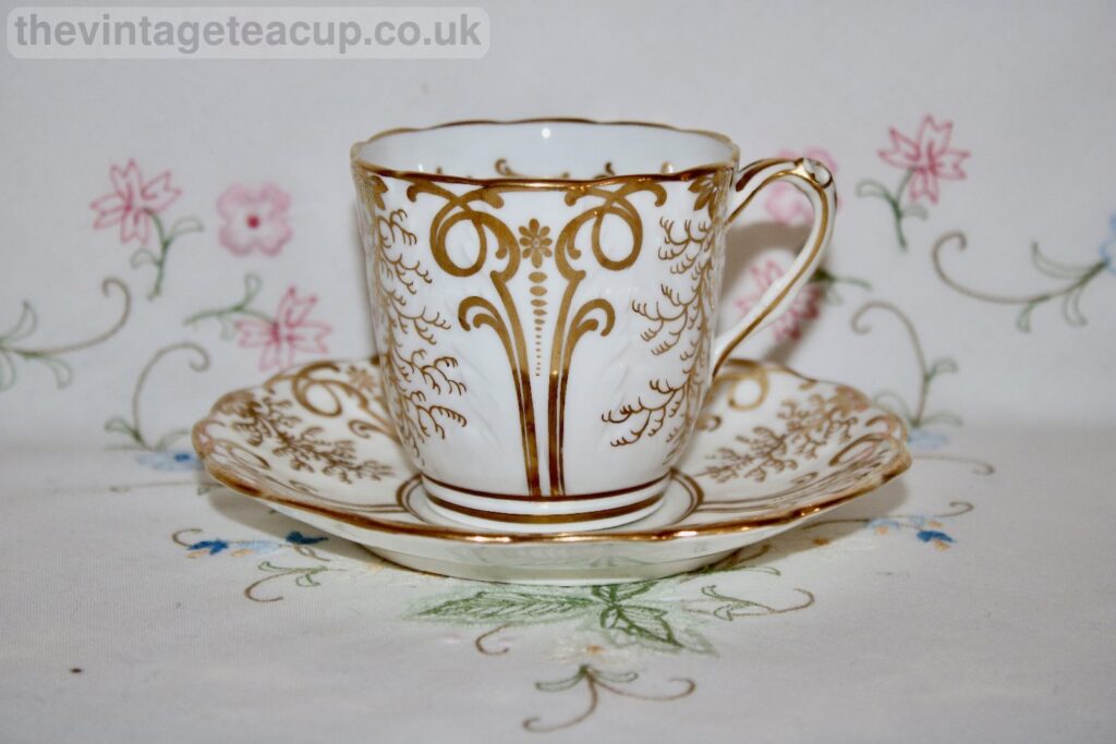 Early English Gilded Porcelain Teacup And Saucer Coalport